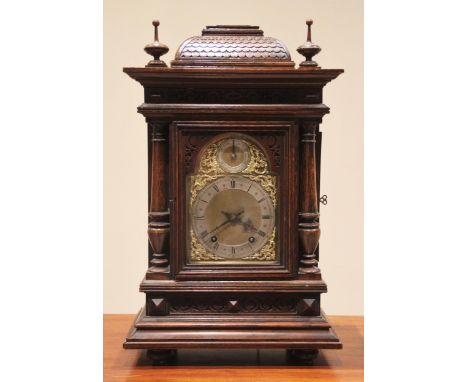 An early 20th century oak cased German bracket clock byWinterhalder & Hofmeier, the architectural case enclosing the 17cm bra