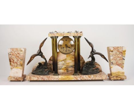 A 1930's Art Deco variegated marble portico mantel clock garniture, the suspended 10cm drum dial with a two train movement, u