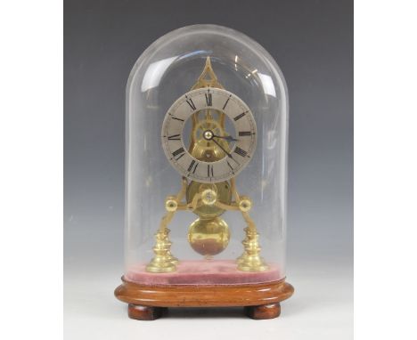 A Victorian brass skeleton mantel timepiece, the silvered chapter ring applied with Roman numerals, enclosing the single fuse