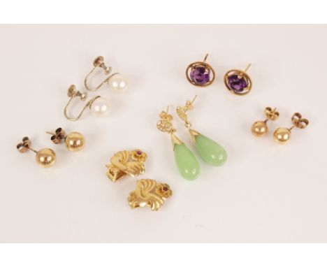 A selection of vintage dress earrings, to include a pair of ruby set gold coloured floral clip on earrings, each 23mm long, a