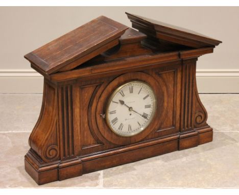 A 19th century and later oak architectural pediment timepiece, possibly from a municipal building, the substantial case with 