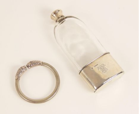 A Victorian glass and silver mounted hip flask, Wright &amp; Davies, London 1867, the colourless glass body of curved rectang