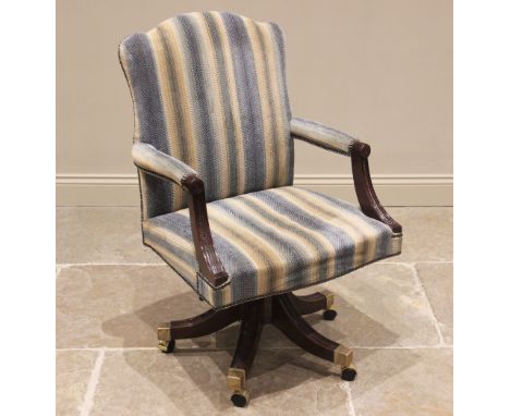 A Gainsborough style swivel office chair, modern, in striped fabric, the shaped and padded back rest extending to padded arm 