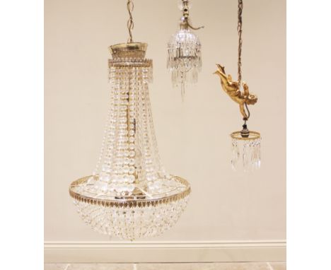 A 19th century style gilt metal and glass droplet basket chandelier, late 20th century, with two graduated tiers of glass dro