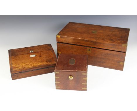 A 19th century mahogany campaign writing box, opening to a skiver inset writing slope with stationery compartments, 40cm wide