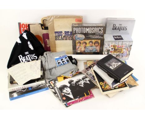 A collection of Beatles memorabilia, to include THE BEATLES ANTHOLOGY book (cellophane wrapped), The Beatles Anthology VHS vi