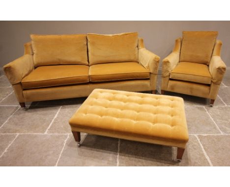 A Duresta 'Trafalgar' three seater sofa, in mustard coloured velour fabric, raised upon front legs of tapering square section