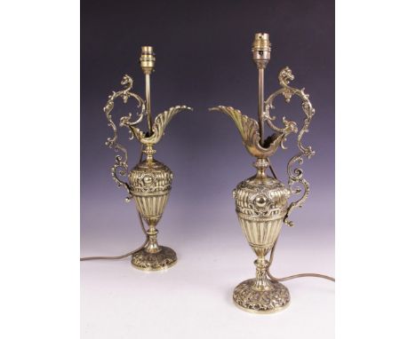 A pair of Victorian style gilt brass ewer table lamps, early 20th century, each of lobed baluster form, applied with an open 