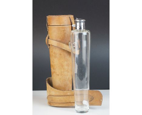 A vintage leather saddle flask holder with silverplated and glass flask by James Dixon and Sons 