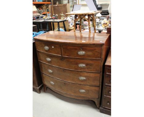 Early 20th century Mahogany Bow Fronted Chest of Two Short over Three Long Drawers, raised on swept bracket feet, 104cms wide