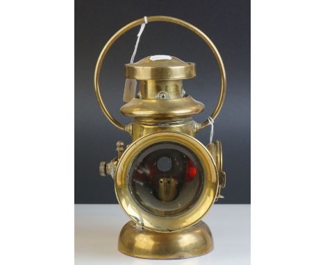 An antique brass car H &amp; B tail light, no.1100 