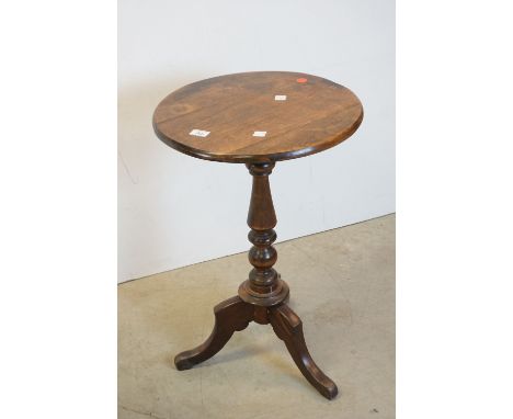 Stained Wooden Circular Wine / Lamp Table raised on a turned column and three legs, 46cms diameter x 68cms high 