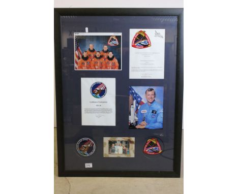 A framed Space Shuttle ephemera group to include signed photo image of Colonel Mark N Brown,image of crew of Space Shuttle mi