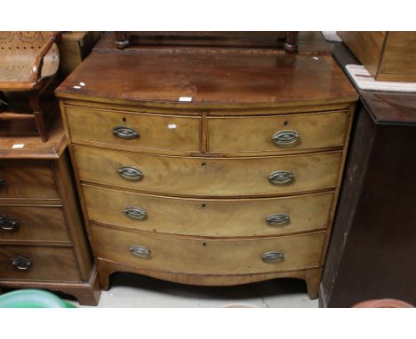 Early 20th century Mahogany Bow Fronted Chest of Two Short over Three Long Drawers, raised on swept bracket feet, 103cms high