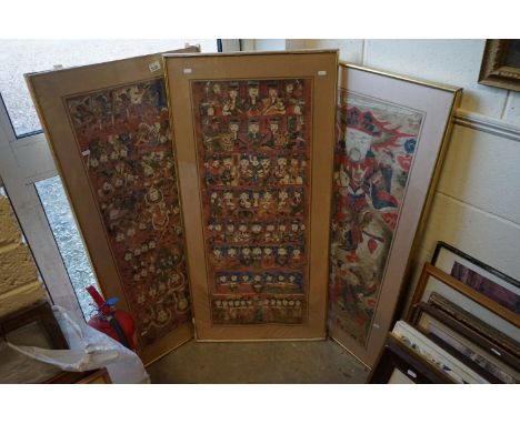A pair of framed and glazed Tibetan paintings of head portraits of men and women together with a  Japanese portrait of a samu
