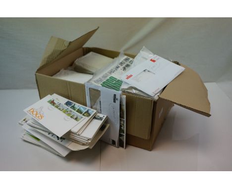 A large quantity of first day covers in albums and loose. 