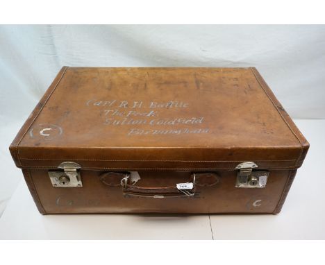 A  1930s/40s large leather suitcase belonging to Captain R H Baillie of Sutton Coalfield insciribed with details. 