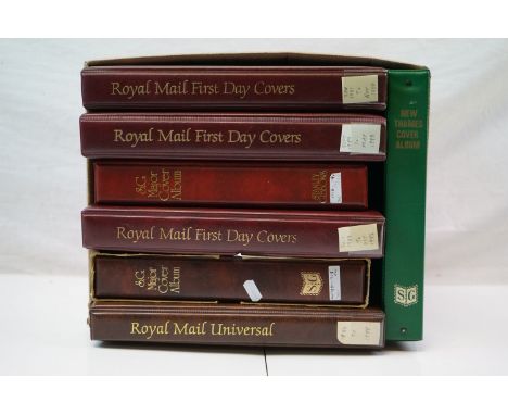 Seven albums of first day covers. 