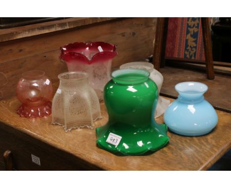 Six antique glass oil lamp shades to include cranberry. 