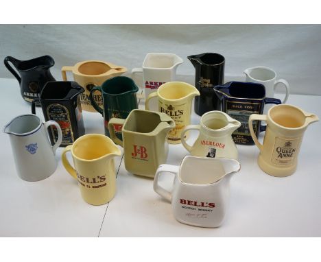 Collection of Fifteen Ceramic Pub Advertising Jugs including Wade and Martell Grand National Void Race Jug 