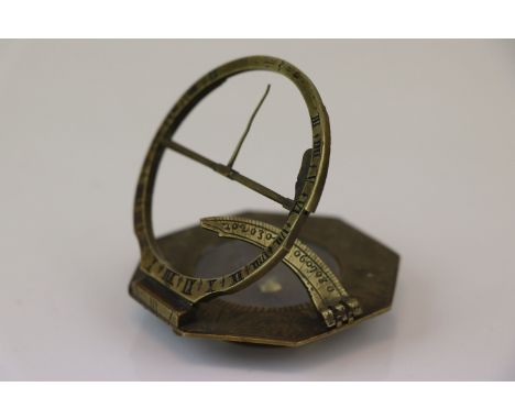 Early 18th century pocket combination compass sundial by L. Grafs, the octagonal brass case with circular brass compass and s
