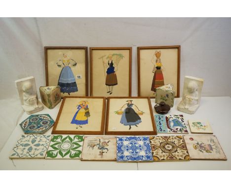 Two pairs of plaster bookends one in the form of children reading together with 9 coloured tiles and 5 costume prints. 