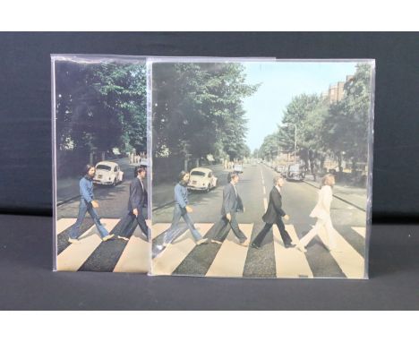 Vinyl - 2 copies of The Beatles Abbey Road.  The first with misaligned apple, no Her Majesty credit on sleeve or labels EX / 