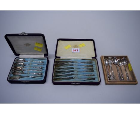 A cased set of Japanese sterling butter knives, by K. Uyeda; together with a matching cased set of teaspoons; and a further s