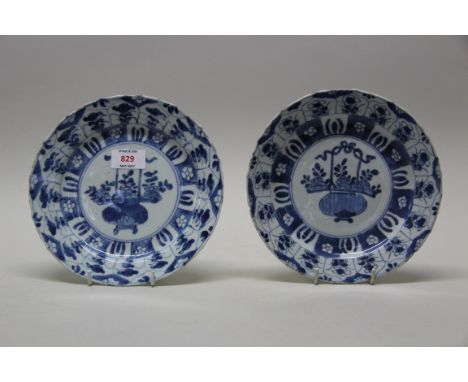 A pair of Chinese blue and white plates, Kangxi, 21cm diameter. (2)