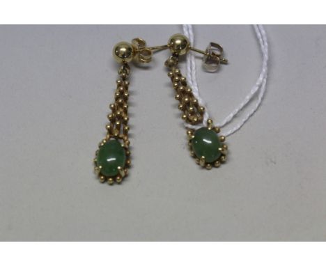 A pair of Chinese gold and jade earrings, the backs stamped 'Von Dell 14k'. (2)