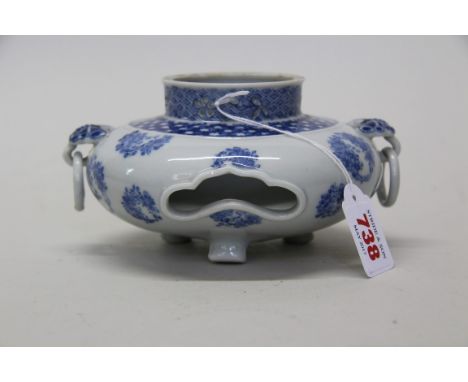 A Japanese blue and white twin handled tripod koro, probably Arita, with buterfly handles, 17.5cm wide,