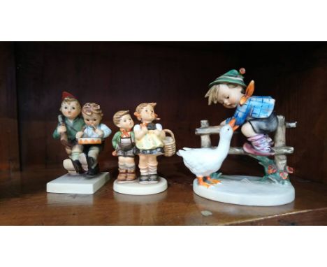 Three Hummel figures