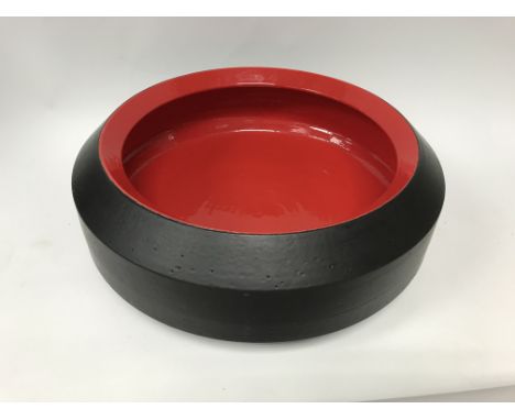 A large 1970s/80s black and red Bitossi ceramic studio pottery bowl by Aldo Londi.