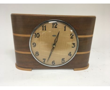 An Art Deco design mantel clock maker Metamec. Fitted with a latter battery operated quartz movement.
