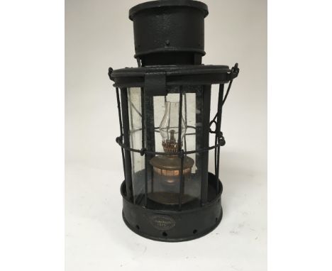 A Black painted metal I World War Trench lantern with applied Christopher Collins 1915 makers label.