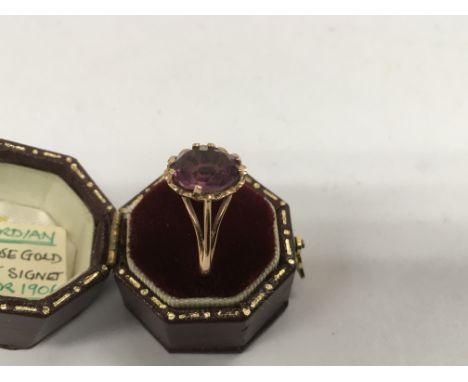 An Edwardian 9 ct gold signet ring inset with amethyst ston Chester 1906 size N .