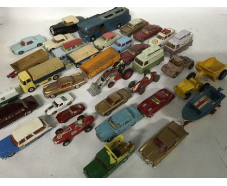 A collection of play worn diecast vehicles including Corgi and Matchbox