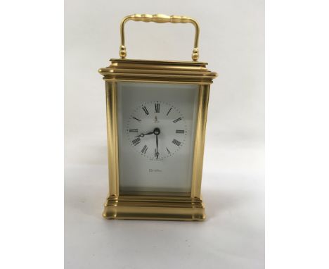A griffin gilt case carriage clock 12 cm