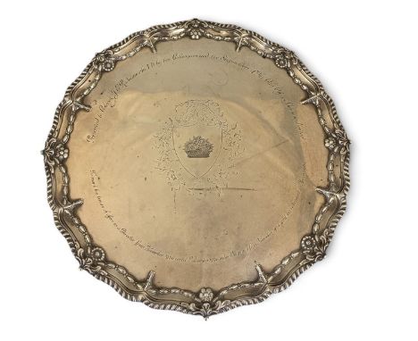 A George III silver salver with a later inscription, Ebenezer Coker, London, 1772
With pie-crust lobed edge, with bellflowers