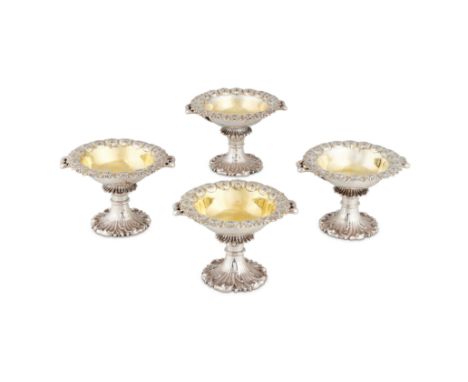 A good set of four Victorian parcel-gilt silver salts by Messrs. Barnard, London, 1848
With bifurcated handles under lily pad
