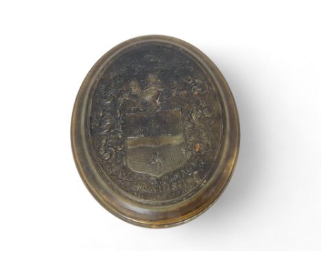 An early 18th century pressed horn oval tobacco box commemorating Sir Francis Drake by John O'Brisset (fl. 1705-1728)
The lid