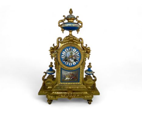A 19th century French gilt bronze and S&egrave;vres style porcelain mounted mantel clock by Phillipe Mourey the movement by J