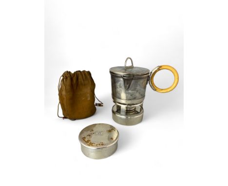 A French Art Deco silver travelling kettle set probably by Gustave Keller
Comprising of a kettle, detachable ivory ring handl
