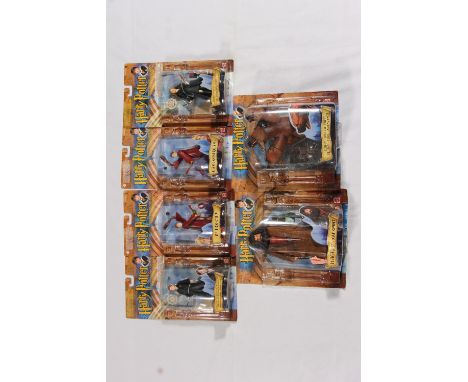 Mattel figures from Harry Potter and the Philosopher's Stone circa 2001 to include 54875 George, 55530 Fred, 52665 Gryffindor