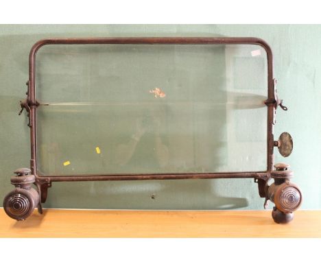 Automobilia interest, a 1920s motor car windscreen and headlamps, the tax disc dated 1929, possibly from a Crossley motor, 11