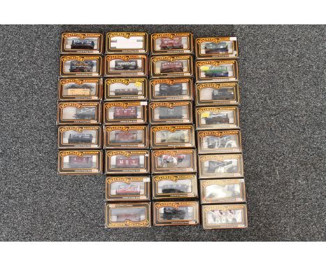 Thirty Mainline OO gauge model railways rolling stock wagons and vans to include 37174 fruit van GWR, 37179 coke wagon TWW, 3