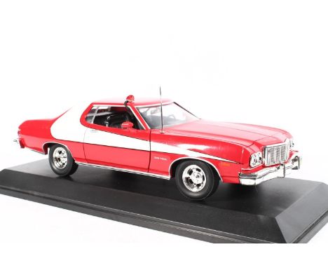 Ertl Collectibles 1:18 scale diecast American Muscle model vehicle 32485 The Dukes of Hazard 1969 Charger General Lee on stan
