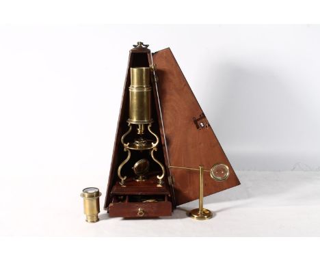 Harris & Son of London brass Culpeper type monocular microscope raised on stage with base drawer and held in a mahogany obeli