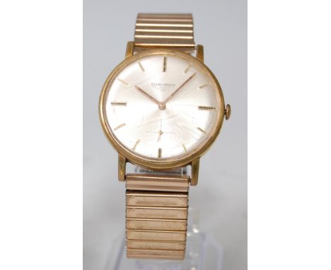 A gent's vintage Longines gold plated wristwatch, having a signed silvered dial, with subsidiary seconds dial, baton markers,