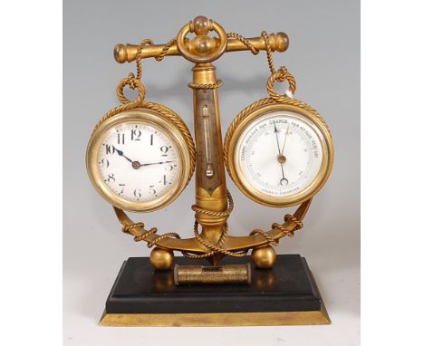 A late Victorian gilt metal nautical desk-top compendium clock barometer, composed of a central anchor with thermometer tube 